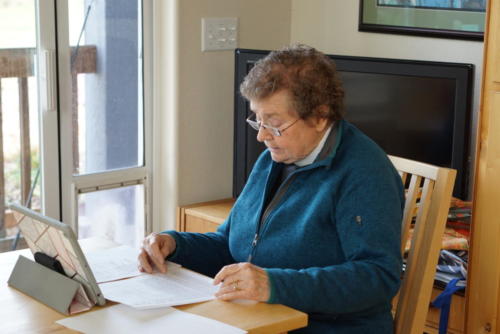 Deacon Diane reading from home